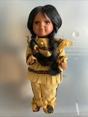 Native American Porcelain Doll With Light Brown Outfit